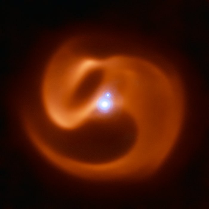 A dust pinwheel imaged in the infrared